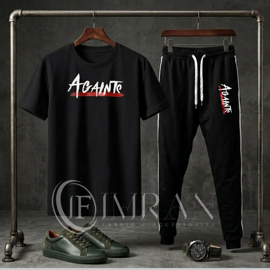 Full 2-piece men's tracksuit featuring a midnight-black"AGAINTS" graphic t-shirt and onyx black joggers hanging on an industrial clothing rack